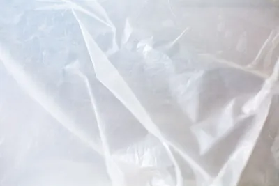 Close view of clear plastic sheeting used to cover surfaces